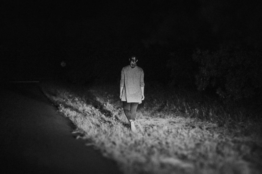 Creepy self portrait in headlights